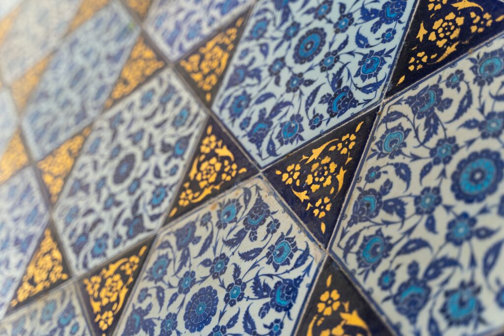 Close up of Islamic ottoman era ceramic golden ornament